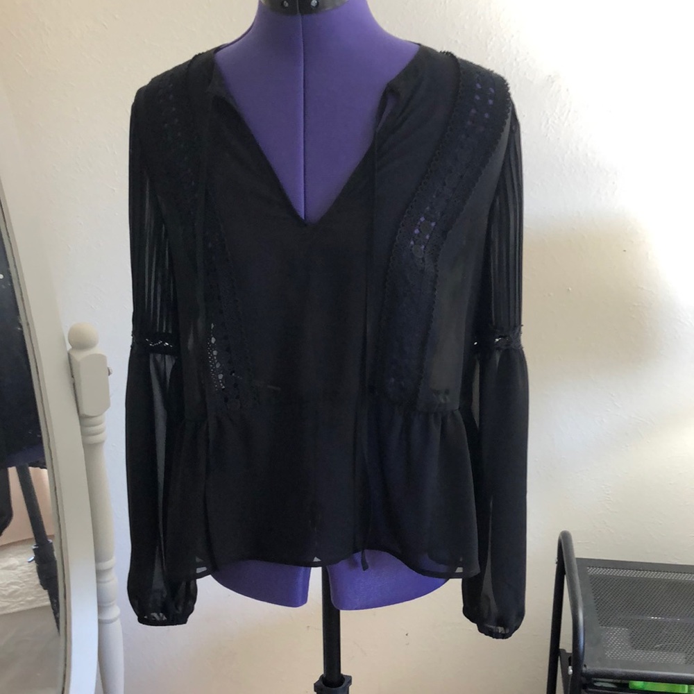 Sheer black blouse